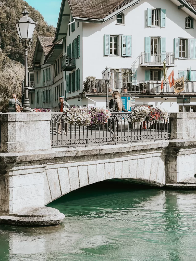 Standing on a bridge in the old part of town