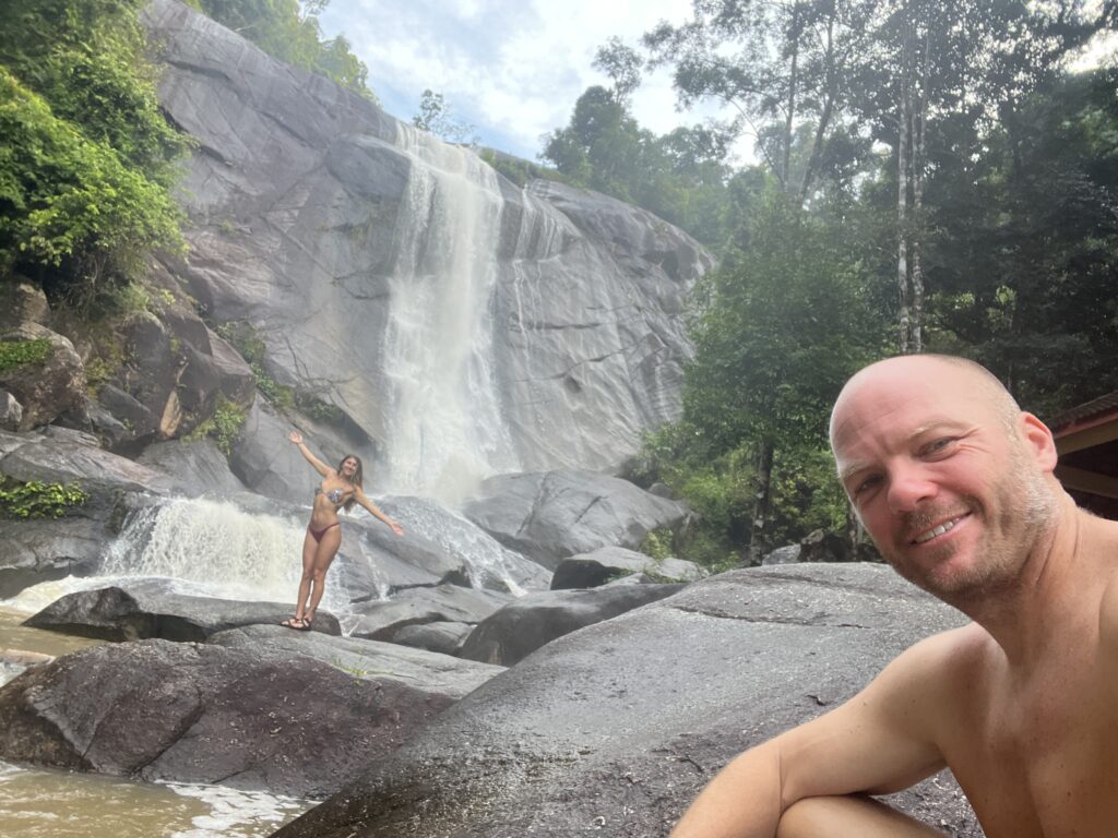 man and woman at seven wells waterfall in Langkawi.