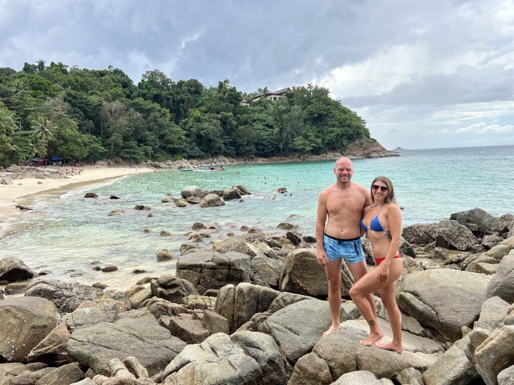 Couple standing on the rocks of Banana Beach on Phuket Island